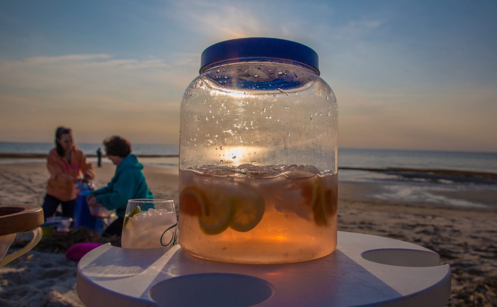 Sweet Afternoon Spritzer with Gustare White Balsamic Vinegar served beachside at sunset