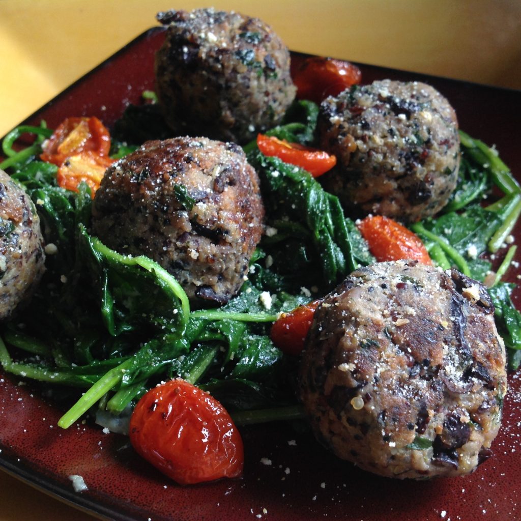 Refreshing Mediterranean spinach salad with roasted tomatoes and crunchy nuts, dressed with our premium olive oil and balsamic vinegar, delivering antioxidants and vibrant flavors in every bite.