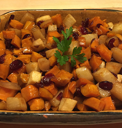 Caramelized roasted turnips and sweet potatoes with dried cranberries made with Gustare Blood Orange Extra Virgin Olive Oil, a gourmet holiday side dish recipe