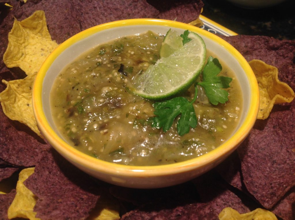 Sweet and spicy homemade salsa verde made with Gustare Chipotle Olive Oil and Habanero Honey Balsamic Vinegar, a bold gourmet Mexican condiment recipe with tomatillos
