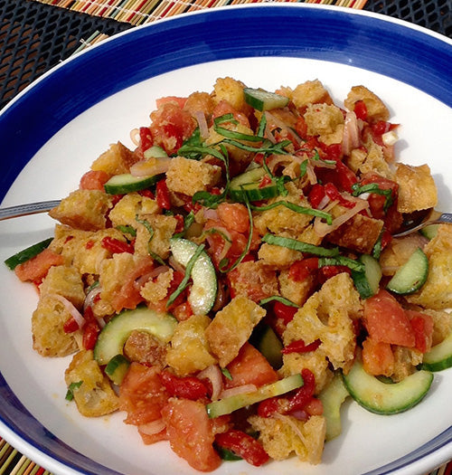 Summer panzanella bread salad dressed with Gustare Barbaresco Wine Vinegar and artisan extra virgin olive oil for an authentic Italian gourmet experience