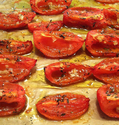Oven roasted Roma tomatoes with Gustare Extra Virgin Olive Oil, garlic, and thyme