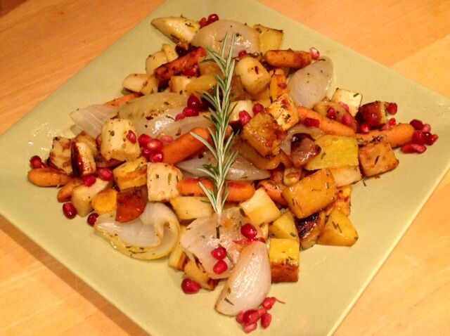Glazed and roasted root vegetables with pomegranate seeds and fresh rosemary, made with Gustare Rosemary Olive Oil and Pomegranate Balsamic Vinegar, an elegant gourmet side dish