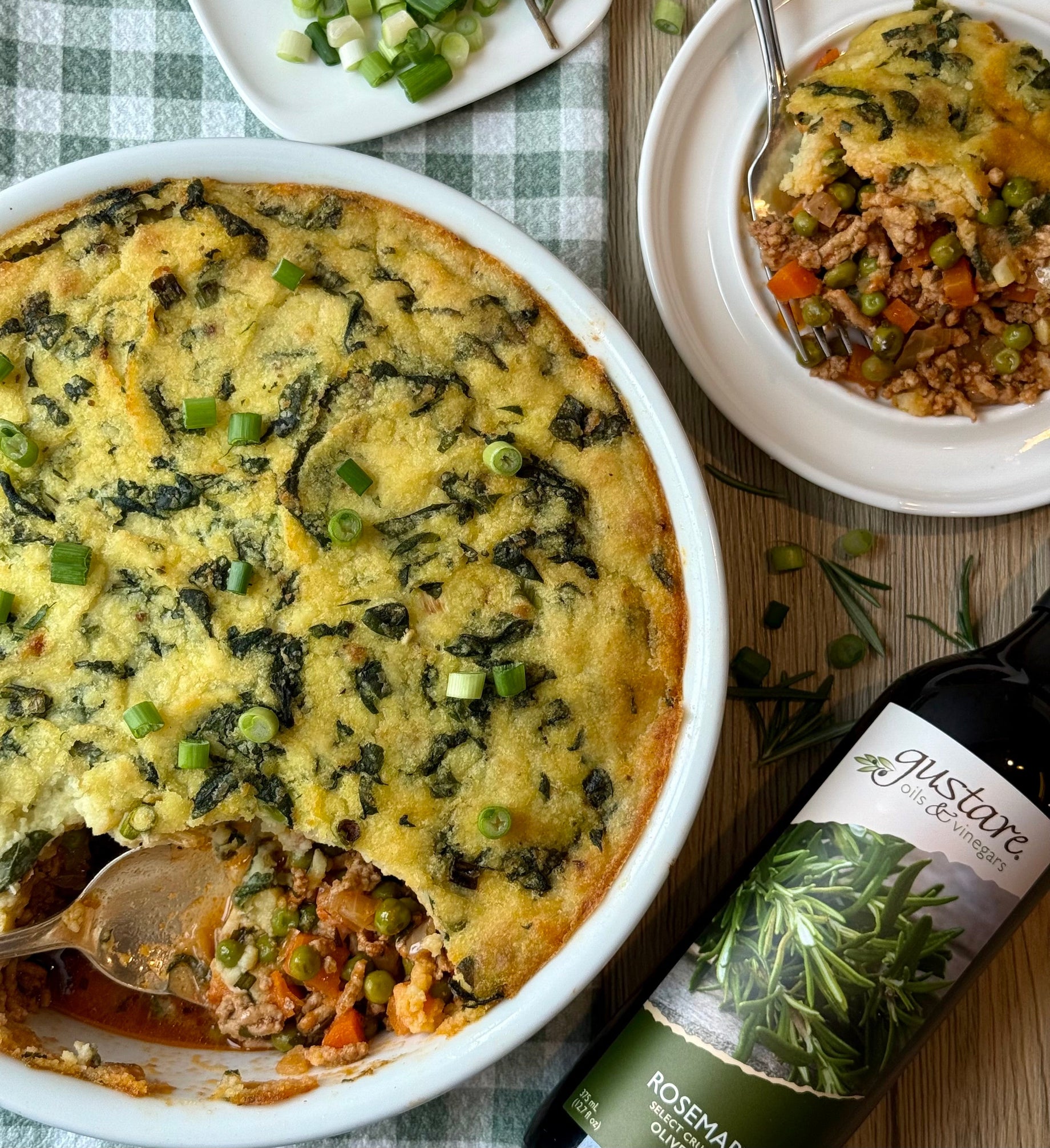 Homemade shepherd's pie with golden kale colcannon topping baked with Gustare Rosemary Extra Virgin Olive Oil