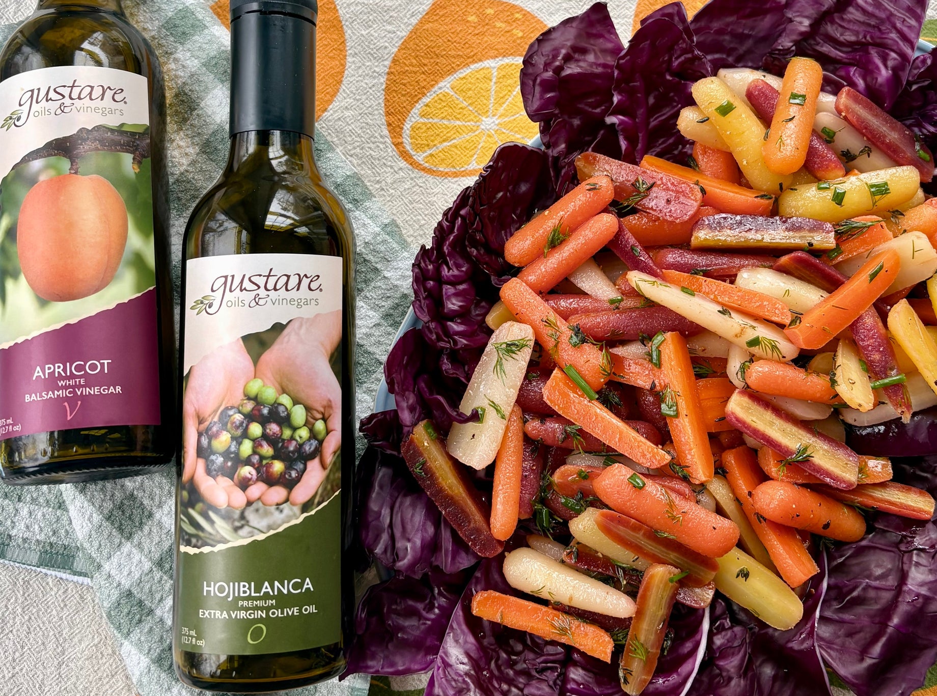 Rainbow carrots with Gusstare Apricot Balsamic and Hojiblanca Extra Virgin Oive Oil. Sweet and savory glazed vegetables for any meal.